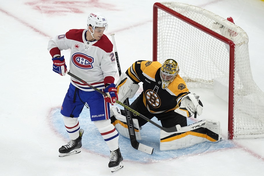 Jeremy Swayman makes a save for the Boston Bruins.