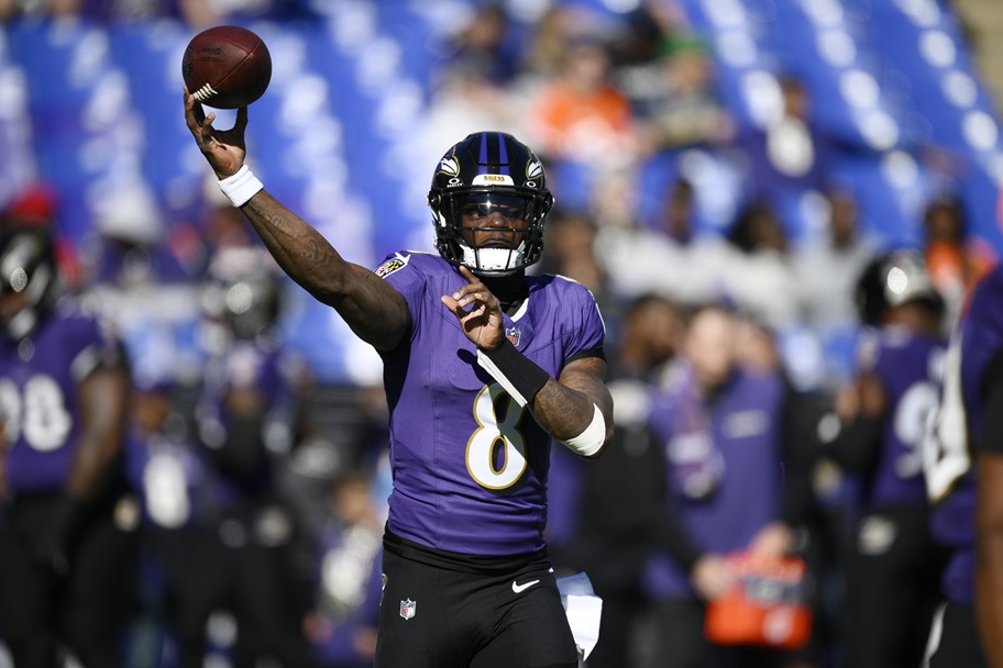 Lamar Jackson throws a pass against the Denver Broncos.